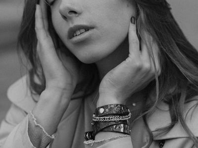 A person holding a challenging balance pose with a serene expression.